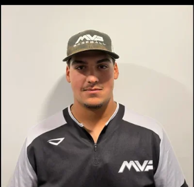 Mike Roy in an MVP Baseball cap and quarter-zip