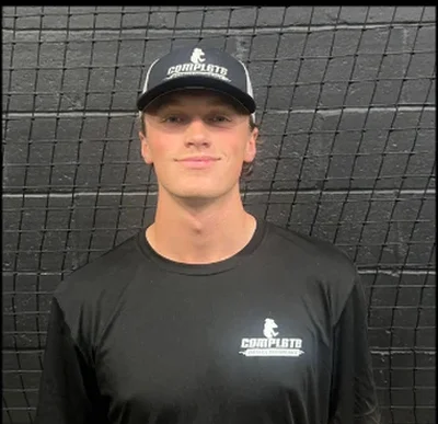 Tyler Cooney in a Complete Baseball Performance cap and shirt